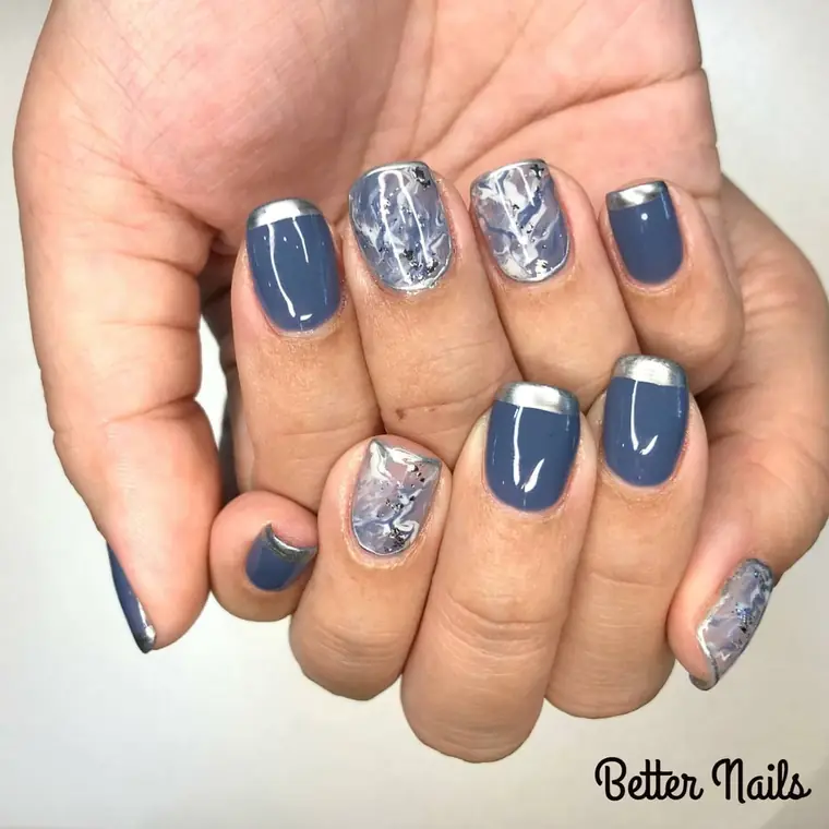 Slate blue gel with marble and silver chrome accent nails