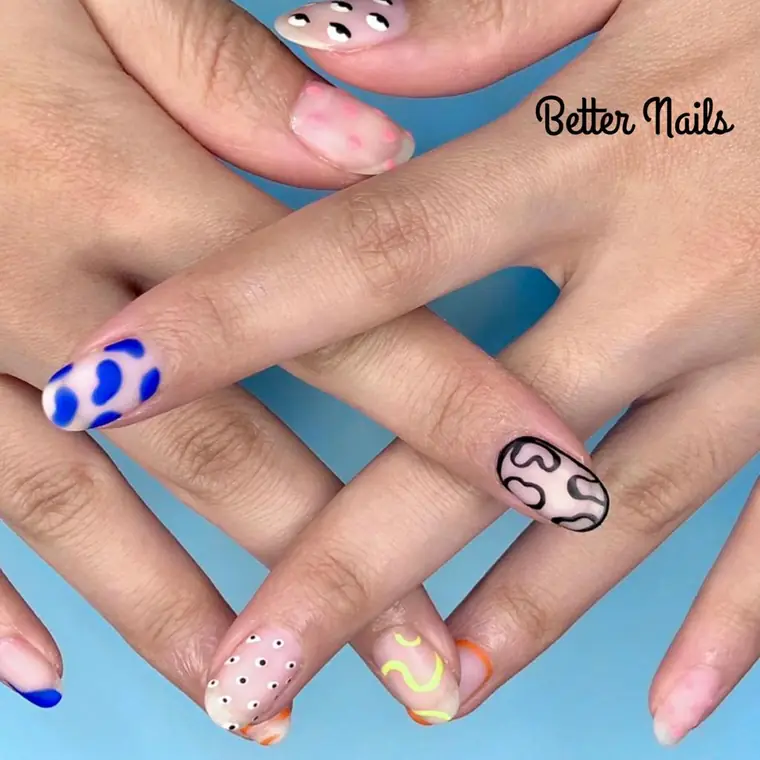 Pastel set with blue dots and black line-art squiggles
