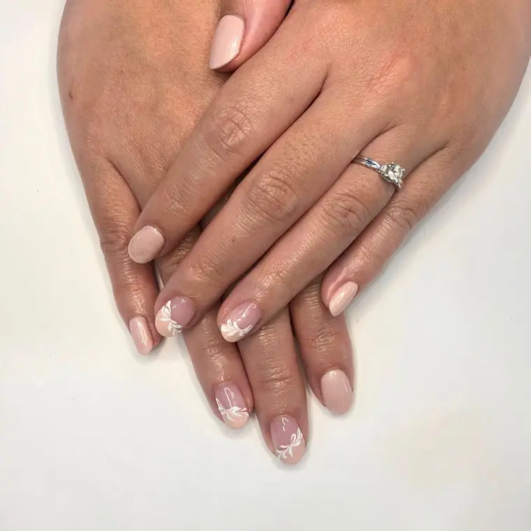 Soft nude pink gel with subtle glitter accents